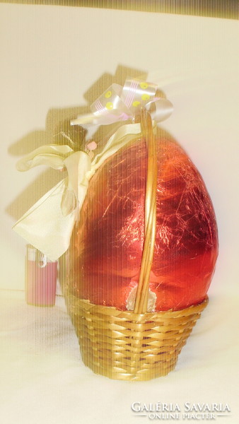 Retro giant Easter chocolate egg in a wicker basket