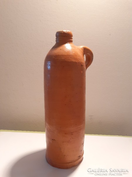 Old tile bottle with folk eared ceramic beverage bottle vintage