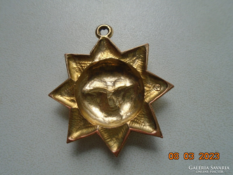 Plastic gold-plated marked sunbeam pendant