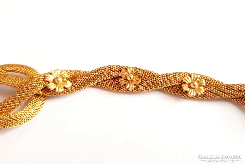 Beautiful unique 18k gold braided flower bracelet