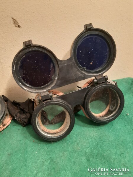 2 old welding glasses