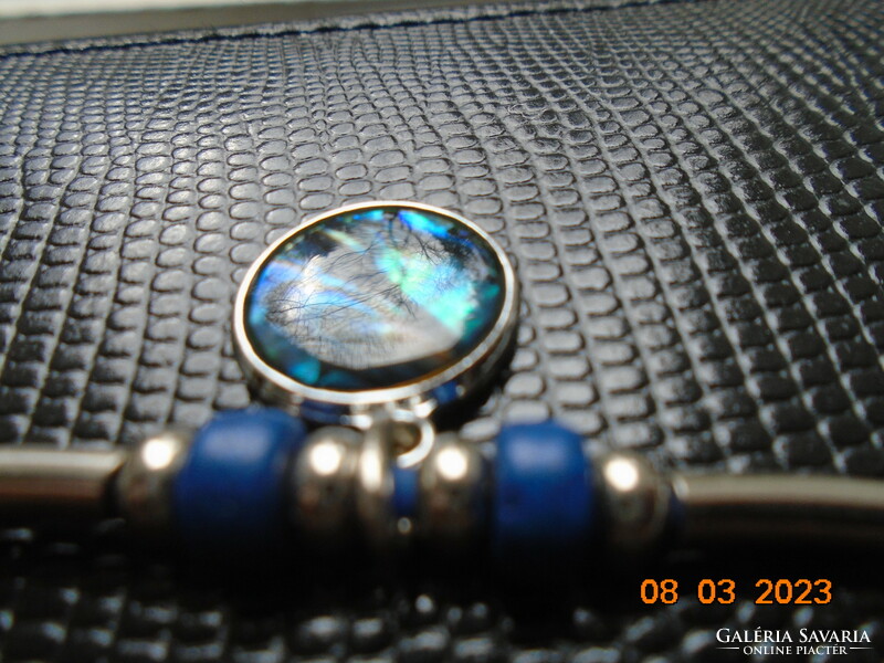 Abalone pendant on a blue rubber choker with silver-plated tube beads