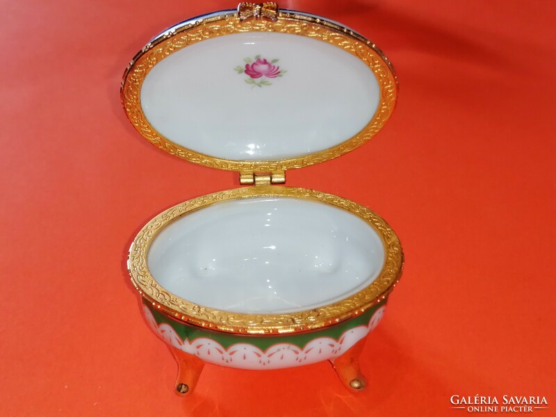 Old, pink jewelry holding porcelain box.