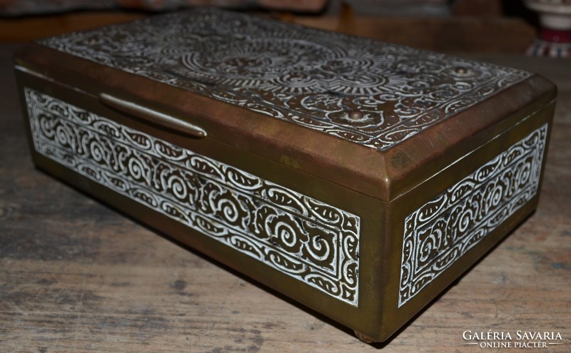 Old brass chest with wooden inlay