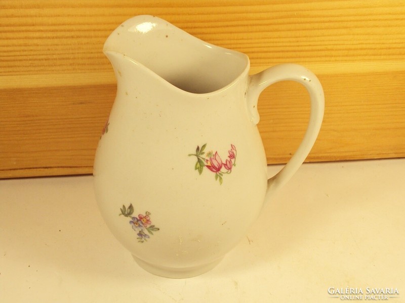 Retro porcelain painted pouring pot with a floral motif