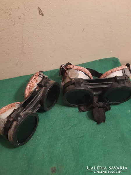 2 old welding glasses