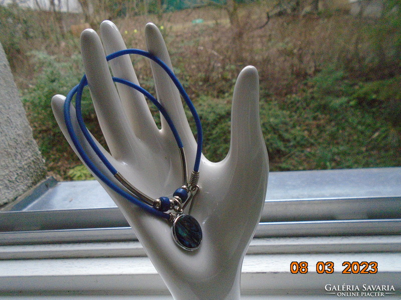 Abalone pendant on a blue rubber choker with silver-plated tube beads