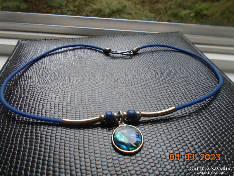 Abalone pendant on a blue rubber choker with silver-plated tube beads