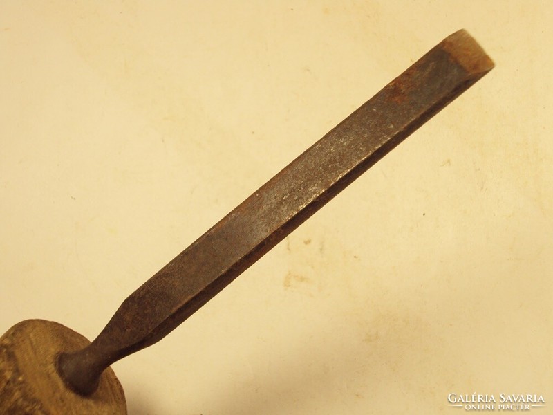 Old wooden chisel, carpentry tool from the 1970s
