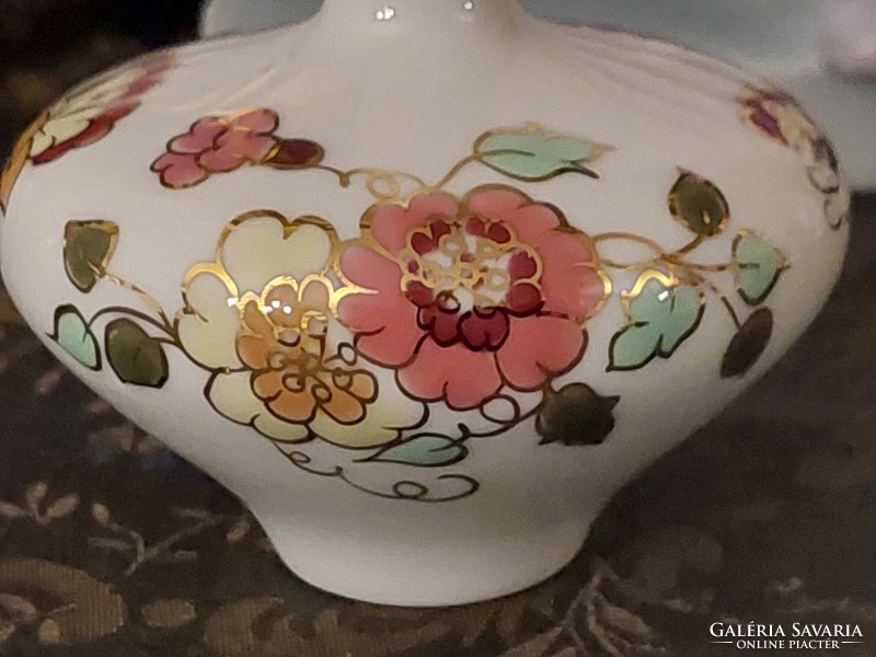 Zsolnay's small vase with butterfly marking 10052/026 is one of the first