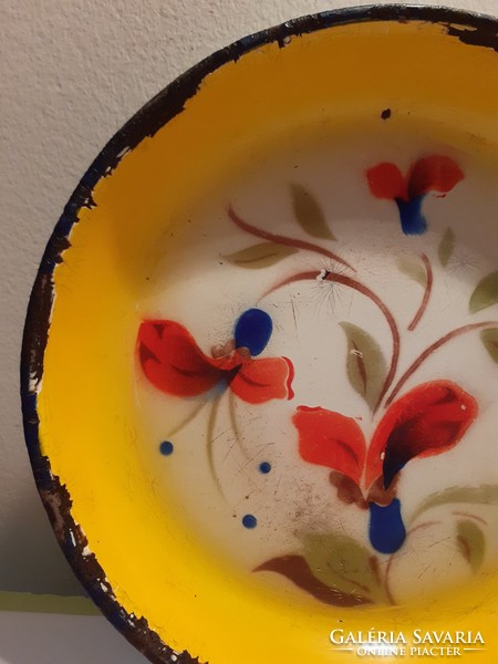 Old Budafok enamel bowl on vintage floral enamel plate