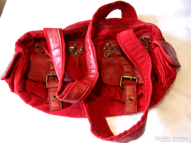 Red cord velvet bag with copper buckles and rivets