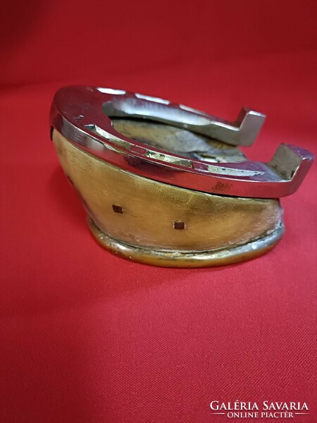 Special horseshoe paperweight.