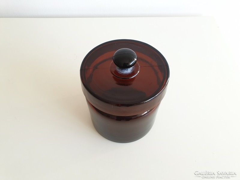 Vintage brown pharmacy bottle with old brown lid