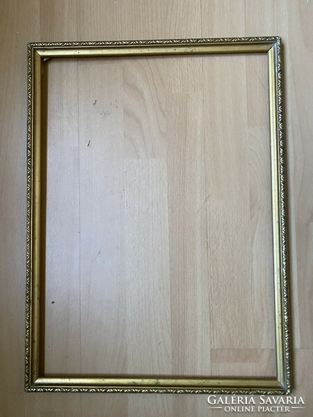 Thin gilded wooden picture frame