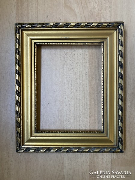 Thick gilded wooden picture frame