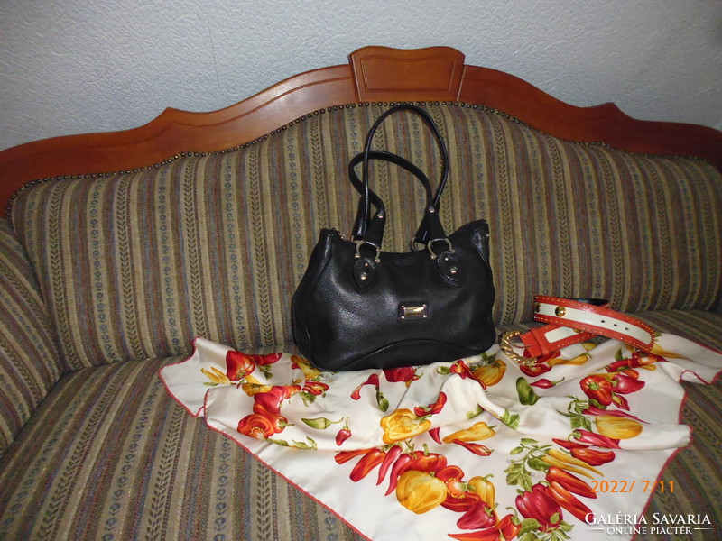 Coccinelle ..Italian genuine leather bag ..Made of cowhide..