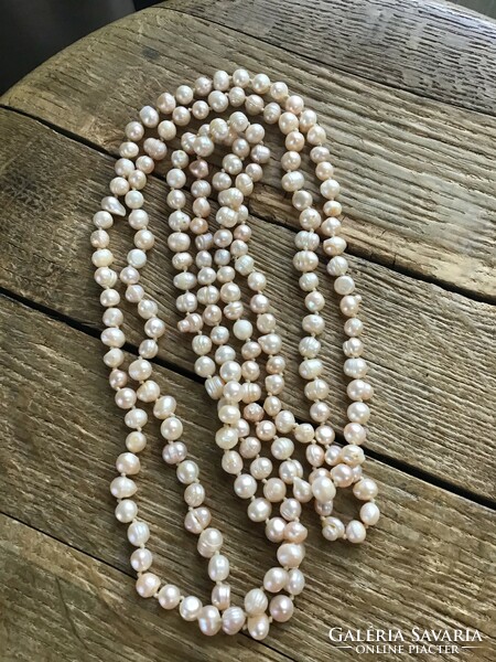 Extra long pearl necklace