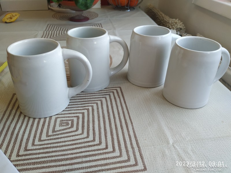 4 ceramic beer mugs for sale!