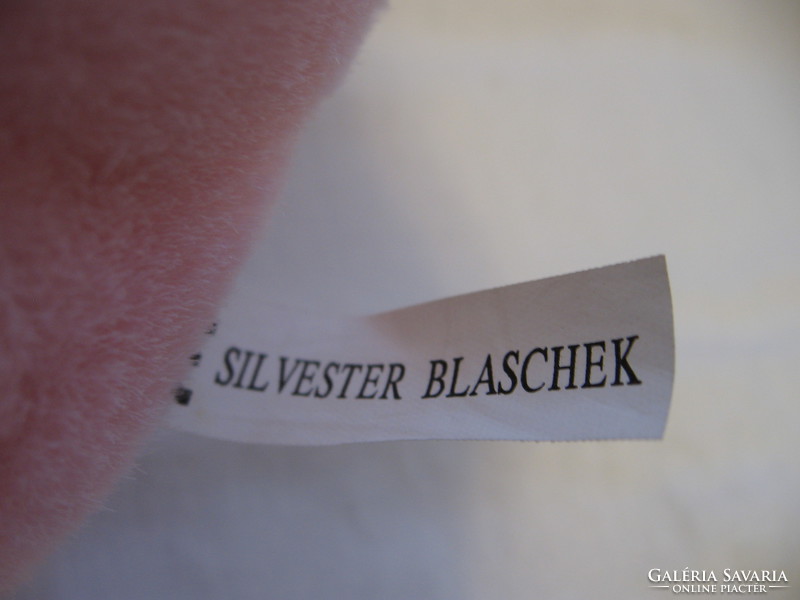 Pink blaschek sitting pig