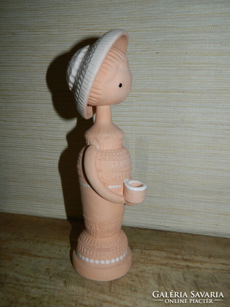 Girl in ceramic hat