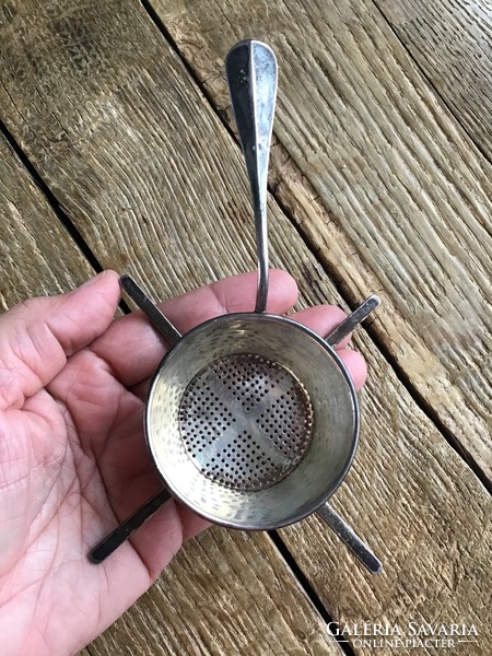 Antique silver tea strainer