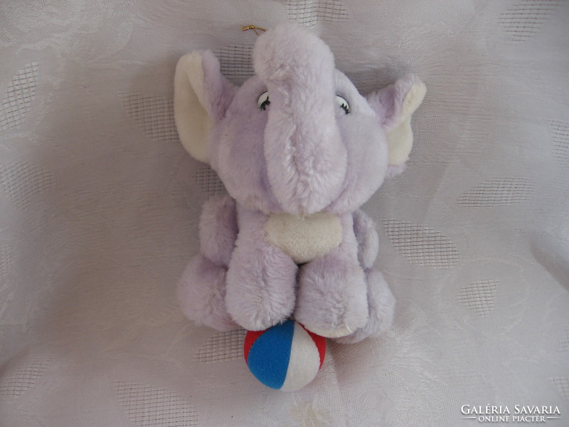 Purple plush elephant with a ball