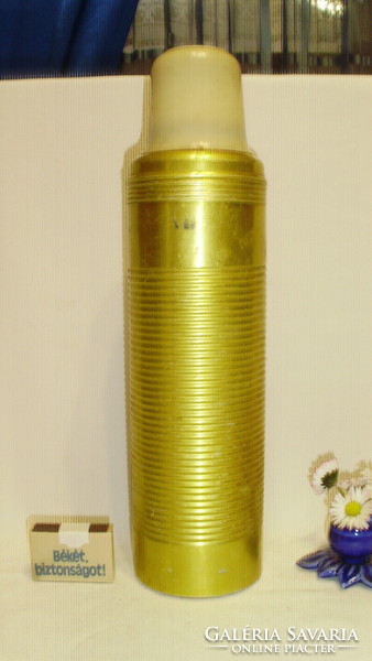 Old metal thermos with vinyl cup