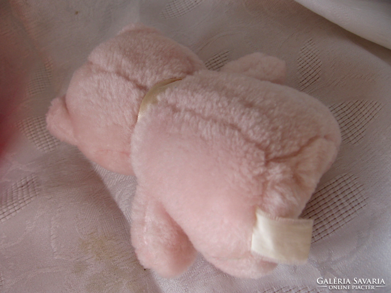 Pink sitting teddy bear