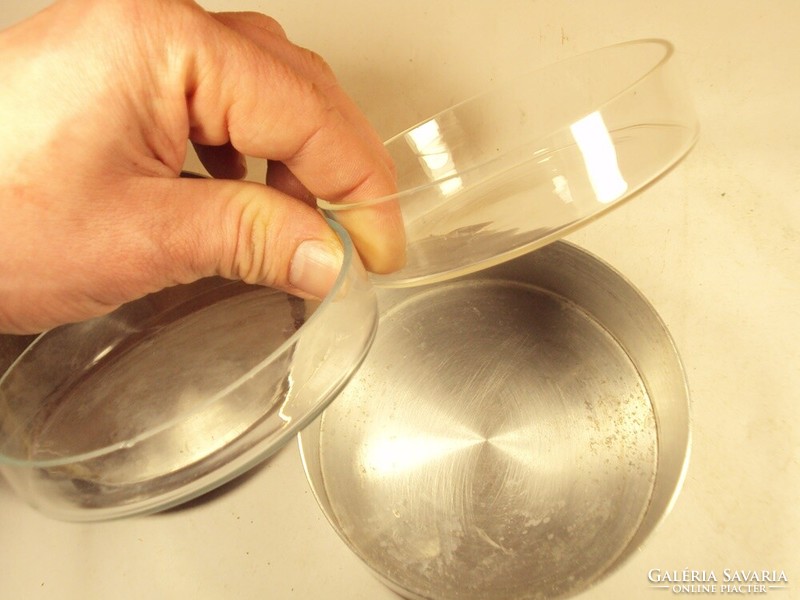 2 old retro laboratory glass jars in an aluminum box