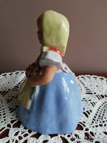 Ceramic little girl with flowers