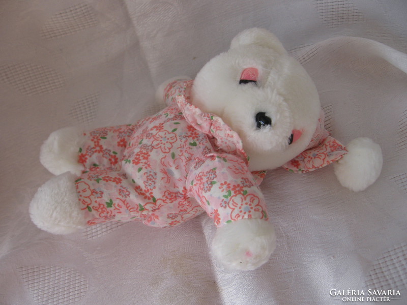 Charming sleeping teddy bear girl