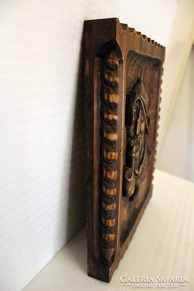 Carved wooden wall picture