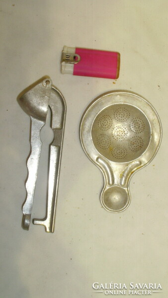 Old garlic crusher and strainer - together