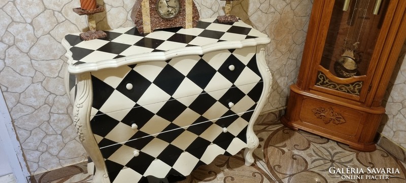 A special baroque chest of drawers with a checkered pattern