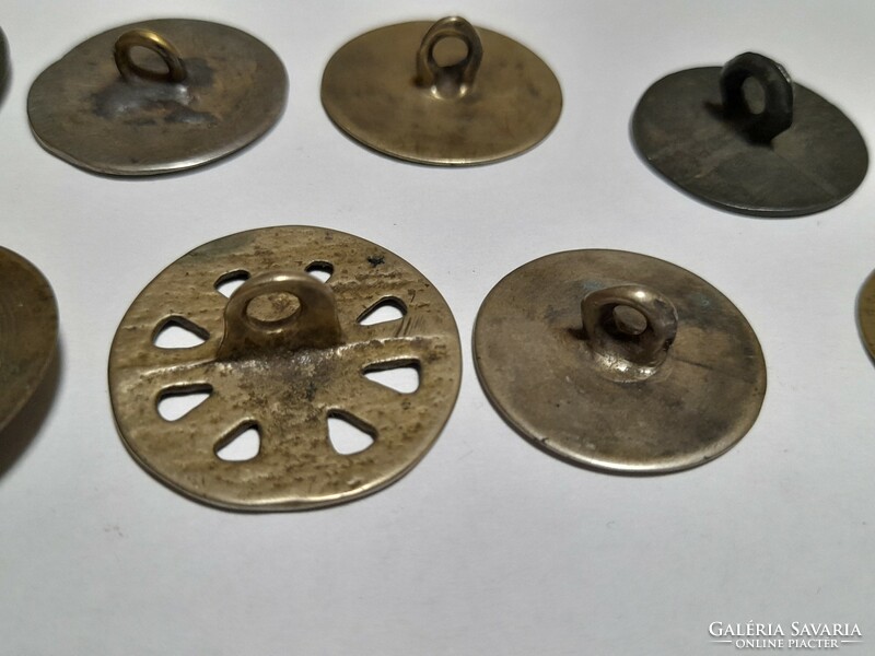 9 antique buttons together