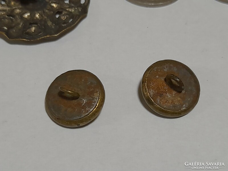 10 antique buttons together