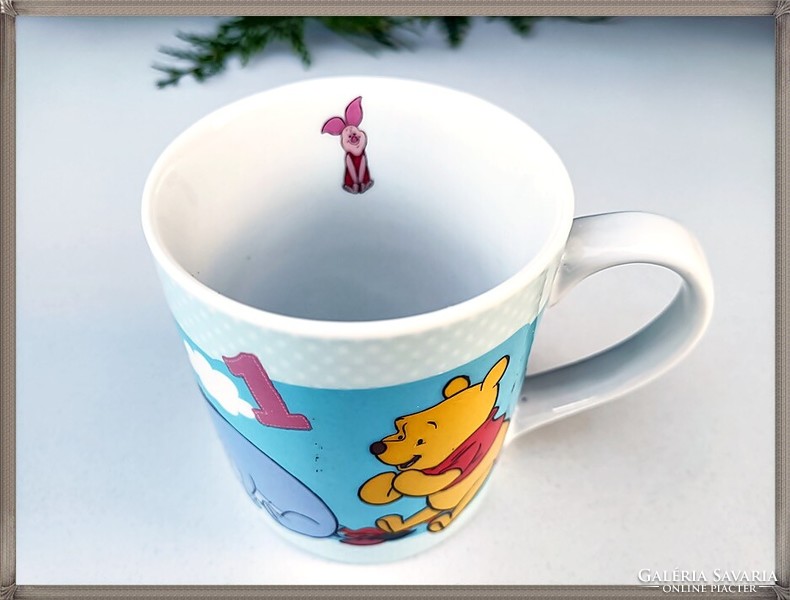 Disney porcelain mug with Winnie the Pooh pattern