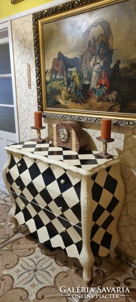 A special baroque chest of drawers with a checkered pattern