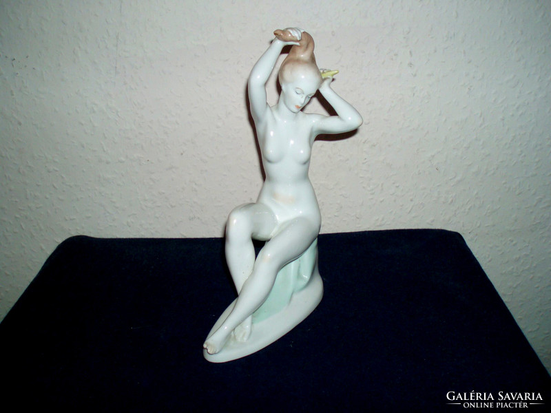 Aquincum - woman combing her hair nude