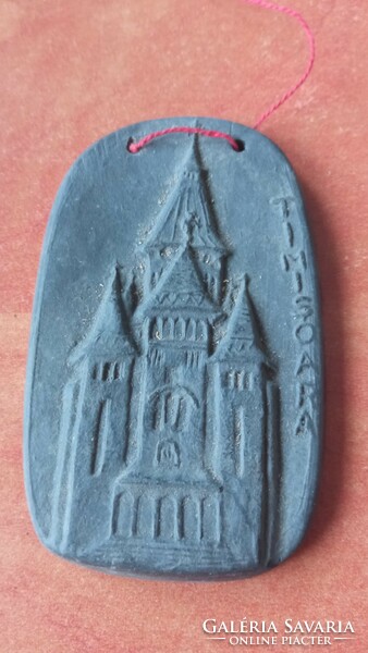 A ceramic miniature wall decoration depicting a Timisoara church is for sale