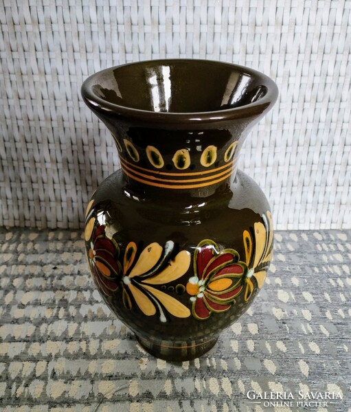 Ceramic vase with a folk motif