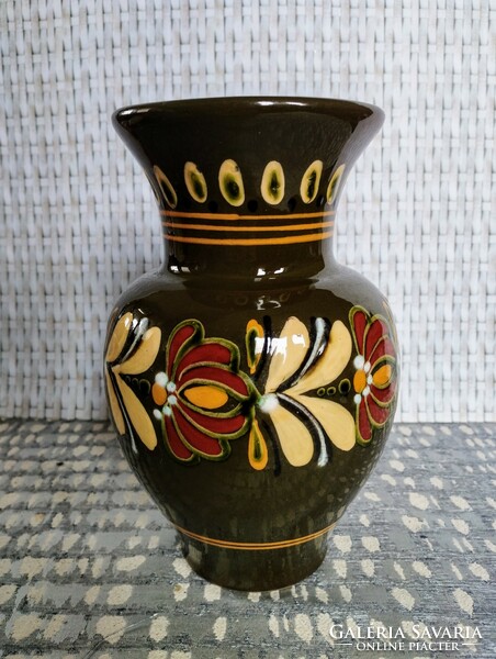 Ceramic vase with a folk motif