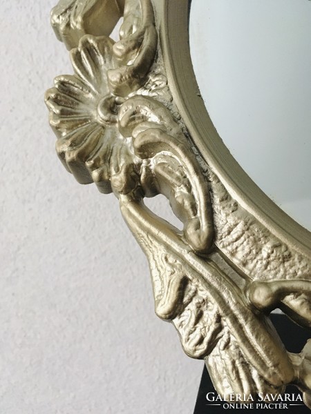 Oval gold mirror-decoration