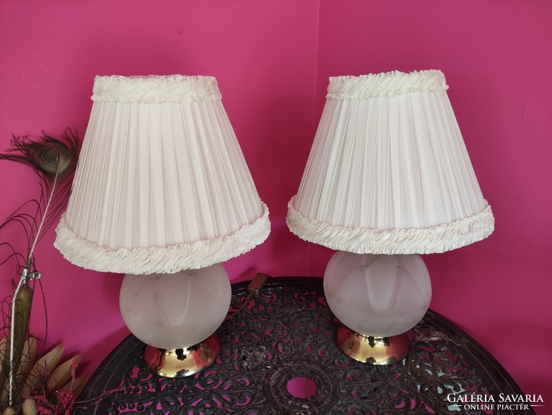 Elegant vintage bedside lamp with a milk glass spherical body and a copper base with a pair of layered white shades
