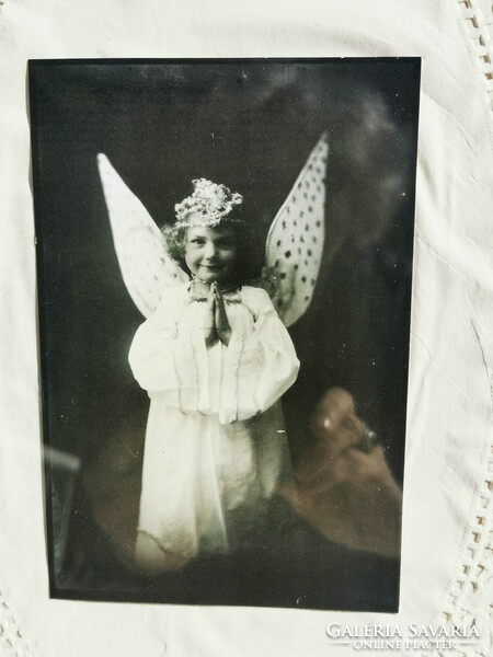 Antique photo, little girl in an angel costume, Christmas,