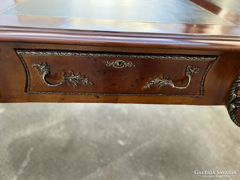 Richly decorated empire style desk with 3 drawers