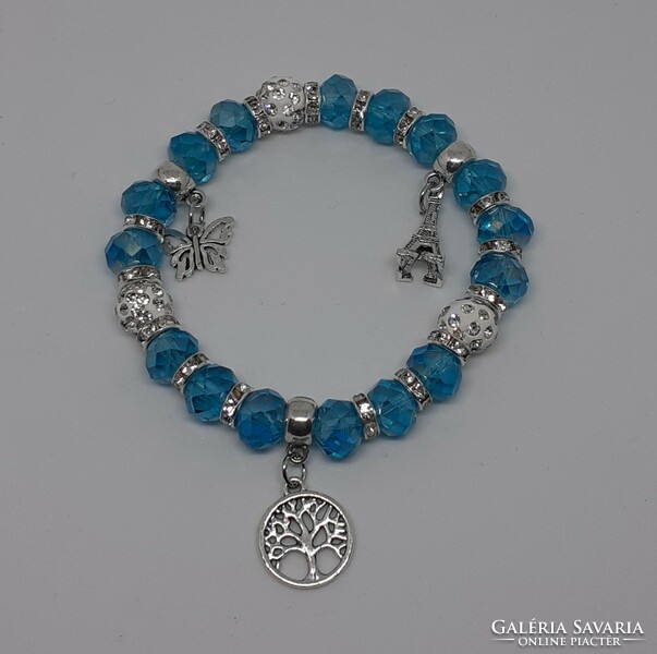 Bracelet with shambala pearls, butterfly, tree of life and Eiffel Tower pendants