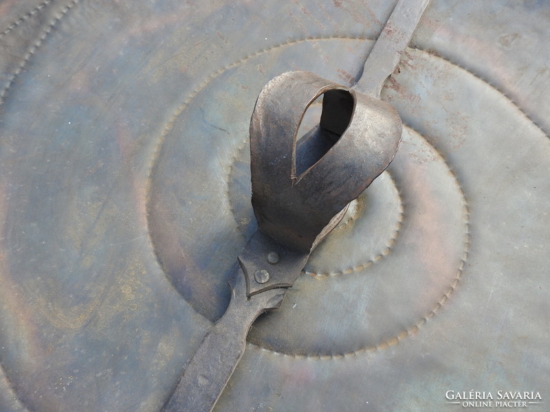 An iron shield custom made by a great blacksmith