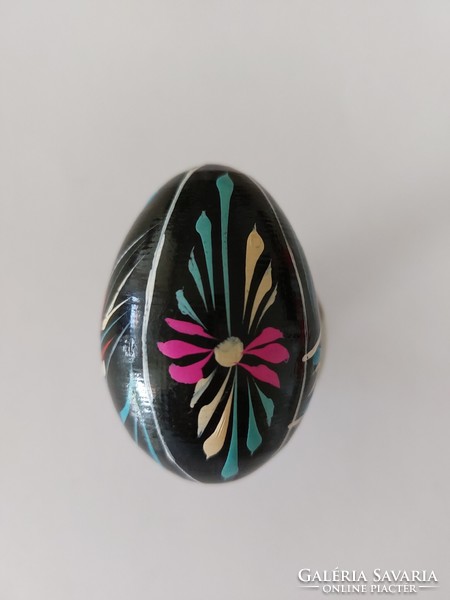 Old painted egg black floral retro Easter wooden egg